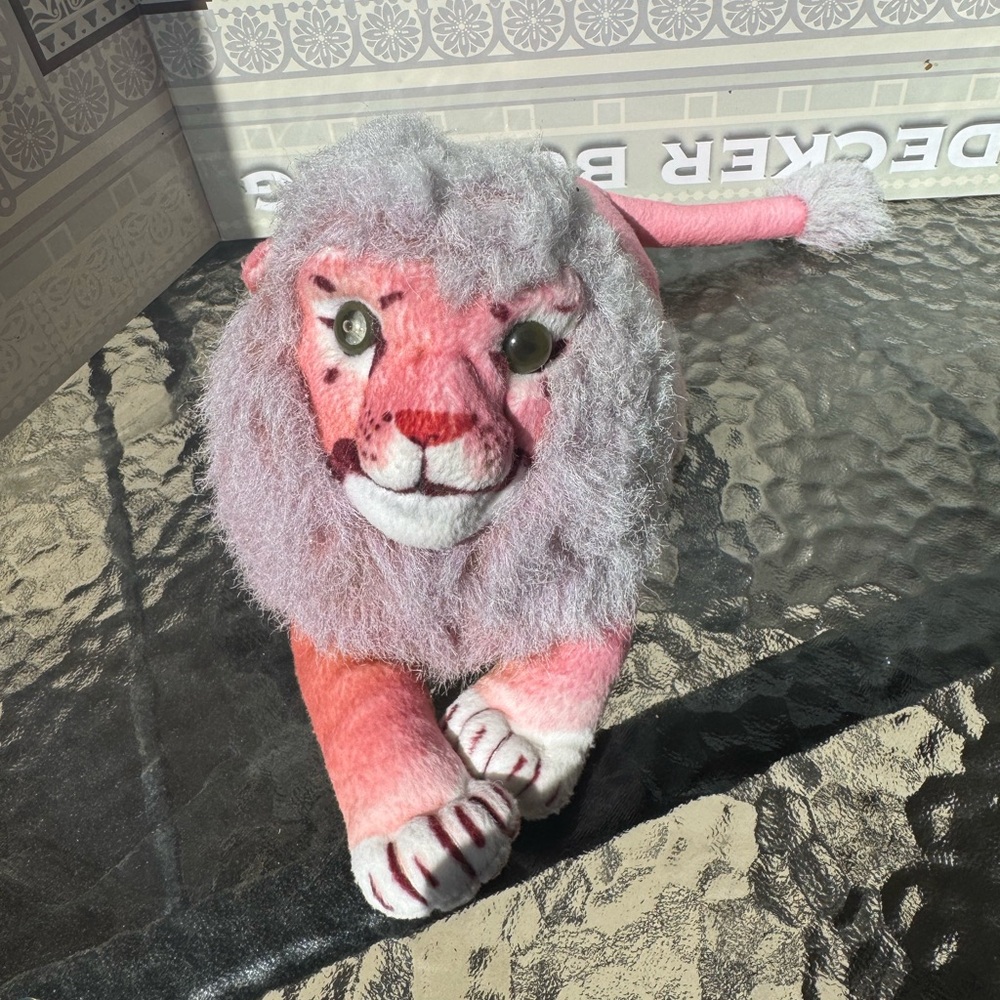 Charming Pink and grey Stuffed Lion Toy